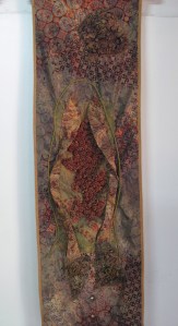 Three dimensional piece, sculpted batik and stitch.