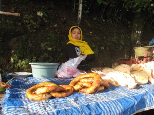 Lady selling sausages.