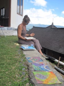 Cristiana sketching while my work dries in the sun
