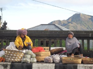 Stall holders with view of  Volcano.