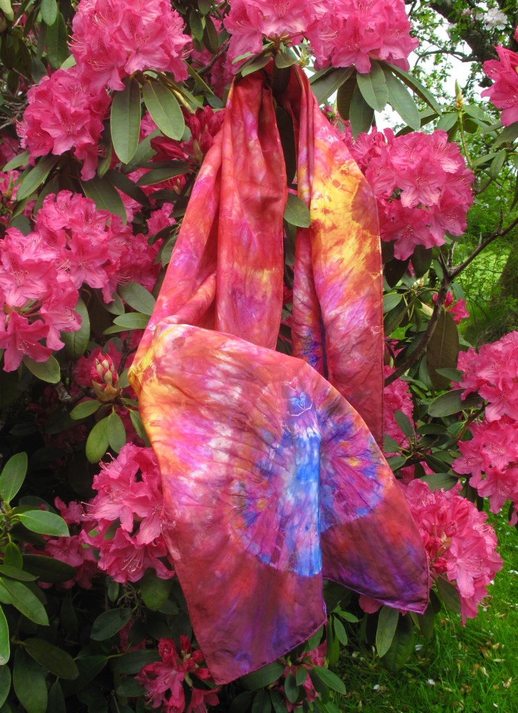 Tie dyed silk in wonderfully bright colours by Marina Elphick, batik artist and painter.