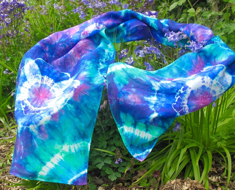 Tie dyed silk in wonderfully bright colours by Marina Elphick, batik artist and painter.