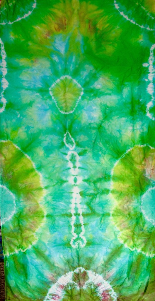 Tie dyed silk in wonderfully bright colours by Marina Elphick, batik artist and painter.