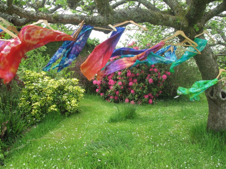 Tie dyed silk in wonderfully bright colours by Marina Elphick, batik artist and painter.