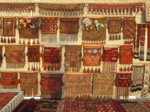 Carpet bags at evening bazaar, Bukhara. Uzbekistan.
