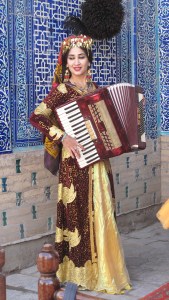Song and Dance in Harem, Khiva, accordion player. Uzbekistan.